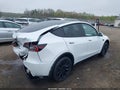 2023 Tesla Model Y — photo 4 of 19 | VIN 7SAYGDEE5PF593427