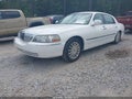2004 Lincoln Town Car — photo 2 of 11 | VIN 1LNHM81W54Y620046