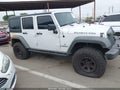 2012 Jeep Wrangler Unlimited — photo 13 of 17 | VIN 1C4BJWFG5CL150248