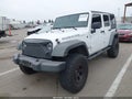 2012 Jeep Wrangler Unlimited — photo 2 of 17 | VIN 1C4BJWFG5CL150248
