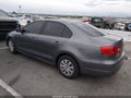 2014 Volkswagen Jetta — photo 3 of 13 | VIN 3VW2K7AJXEM248079