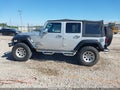 2012 Jeep Wrangler Unlimited — photo 12 of 13 | VIN 1C4BJWDG9CL138266