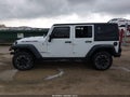2014 Jeep Wrangler Unlimited — photo 14 of 16 | VIN 1C4BJWFG6EL317820