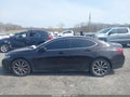 2015 Acura TLX — photo 14 of 16 | VIN 19UUB2F58FA005607