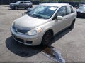 2009 Nissan Versa — photo 2 of 16 | VIN 3N1BC11E99L448384