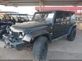 2015 Jeep Wrangler Unlimited — photo 2 of 15 | VIN 1C4BJWEG8FL547023