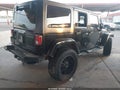 2015 Jeep Wrangler Unlimited — photo 4 of 15 | VIN 1C4BJWEG8FL547023