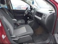 2014 Jeep Compass — photo 5 of 12 | VIN 1C4NJCBA3ED844544