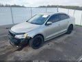 2015 Volkswagen Jetta — photo 2 of 11 | VIN 3VW3A7AJ1FM211690