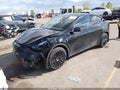 2023 Tesla Model Y — photo 2 of 17 | VIN 7SAYGDEE9PA187714