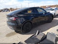 2023 Tesla Model Y — photo 4 of 17 | VIN 7SAYGDEE9PA187714