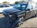 2014 Honda Ridgeline — photo 2 of 21 | VIN 5FPYK1F72EB013453