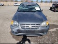 2003 Hyundai Accent — photo 11 of 15 | VIN KMHCF35C93U270269