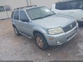 2005 Mercury Mariner — photo 1 of 11 | VIN 4M2CU56195DJ30772