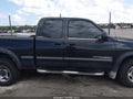 2001 Toyota Tundra — photo 12 of 15 | VIN 5TBRT381X1S145244