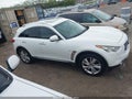 2015 Infiniti QX70 — photo 13 of 16 | VIN JN8CS1MU8FM381175