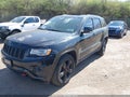 2015 Jeep Grand Cherokee — photo 2 of 17 | VIN 1C4RJECG2FC192863
