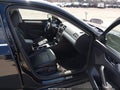 2013 Volkswagen Passat — photo 5 of 14 | VIN 1VWBP7A38DC016079