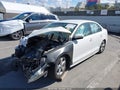 2014 Volkswagen Jetta — photo 2 of 11 | VIN 3VWB17AJ6EM221447