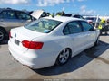 2014 Volkswagen Jetta — photo 4 of 11 | VIN 3VWB17AJ6EM221447