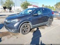 2017 Honda CR-V — photo 2 of 17 | VIN 2HKRW2H96HH669232