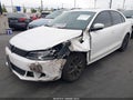 2012 Volkswagen Jetta — photo 2 of 12 | VIN 3VWDP7AJ1CM306068