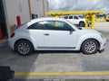 2016 Volkswagen Beetle — photo 13 of 16 | VIN 3VWF17AT6GM606335