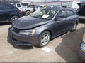 2014 Volkswagen Jetta — photo 2 of 15 | VIN 3VWLL7AJ6EM442335