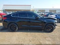 2017 BMW X4 — photo 13 of 16 | VIN 5UXXW3C57H0T77862