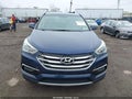 2017 Hyundai Santa Fe — photo 12 of 16 | VIN 5XYZTDLB0HG474930