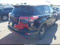 2018 Toyota RAV4 — photo 4 of 15 | VIN 2T3ZFREV4JW465537