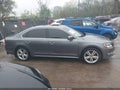 2014 Volkswagen Passat — photo 13 of 21 | VIN 1VWCN7A32EC036579