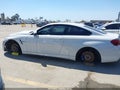 2015 BMW M4 — photo 13 of 16 | VIN WBS3R9C54FK332382