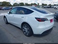 2023 Tesla Model Y — photo 3 of 20 | VIN 7SAYGDEE8PA095350