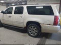 2010 Chevrolet Suburban 1500 — photo 3 of 16 | VIN 1GNUKKE31AR164047