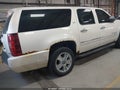 2010 Chevrolet Suburban 1500 — photo 4 of 16 | VIN 1GNUKKE31AR164047