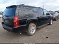 2014 Chevrolet Suburban 1500 — photo 4 of 17 | VIN 1GNSKJE71ER108054