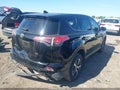 2018 Toyota RAV4 — photo 4 of 16 | VIN 2T3WFREV5JW476209