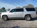 2016 Chevrolet Suburban — photo 14 of 16 | VIN 1GNSCHKC2GR433354