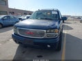 2006 GMC Yukon — photo 12 of 18 | VIN 1GKEK63U26J127650