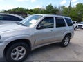 2005 Mazda Tribute — photo 14 of 16 | VIN 4F2CZ04165KM45506