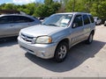 2005 Mazda Tribute — photo 2 of 16 | VIN 4F2CZ04165KM45506