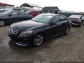 2014 Mercedes-Benz E-Class — photo 2 of 16 | VIN WDDHF0EB3EA880601
