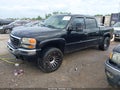 2005 GMC Sierra 1500 — photo 2 of 16 | VIN 2GTEK13T651129125
