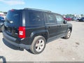 2014 Jeep Patriot — photo 4 of 11 | VIN 1C4NJPFB0ED862607