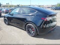 2024 Tesla Model Y — photo 3 of 23 | VIN 7SAYGDEF6RF077332