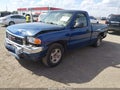 2004 GMC Sierra 1500 — photo 2 of 14 | VIN 1GTEC14X34Z102419