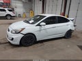 2012 Hyundai Accent — photo 13 of 15 | VIN KMHCT4AE9CU209302
