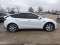 2023 Tesla Model Y — photo 13 of 20 | VIN 7SAYGDEE0PF806719