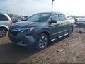 2019 Honda Ridgeline — photo 2 of 16 | VIN 5FPYK3F71KB034592